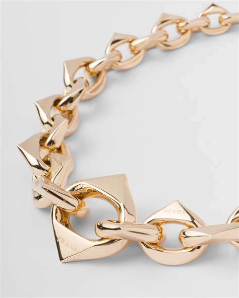 prada triangle ring gold|necklace with triangle pendant.